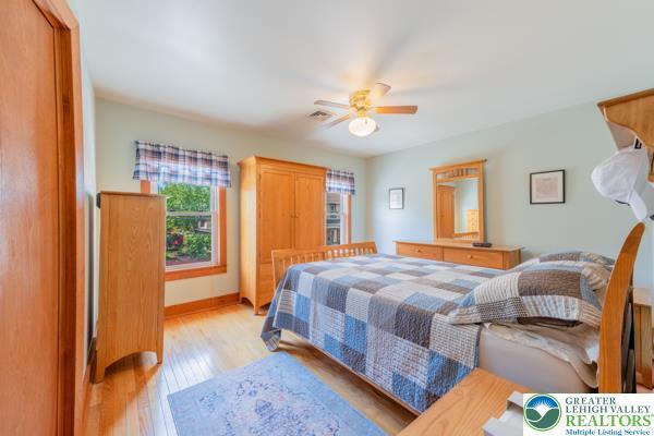 71 N 3rd St, Bangor Borough, PA 18013 - bedroom with light wood-style flooring, a ceiling fan, and baseboards