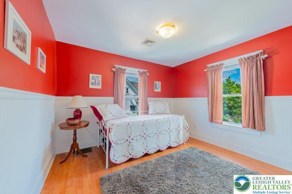 71 N 3rd St, Bangor Borough, PA 18013 - bedroom featuring wainscoting and wood finished floors