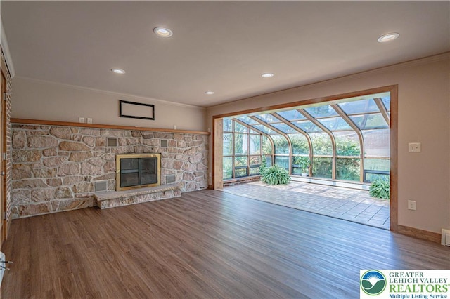 851 N Hoffert St, Fountain Hill Boro, PA 18015 - unfurnished living room with ornamental molding, wood finished floors, plenty of natural light, recessed lighting, and a sunroom