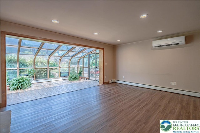 851 N Hoffert St, Fountain Hill Boro, PA 18015 - empty room featuring wood finished floors, a wall mounted AC, recessed lighting, baseboard heating, and baseboards