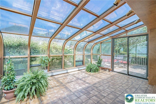 851 N Hoffert St, Fountain Hill Boro, PA 18015 - unfurnished sunroom featuring lofted ceiling and a baseboard heating unit