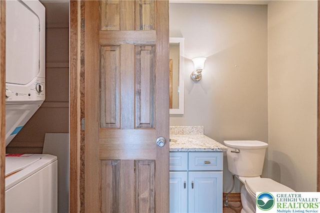 851 N Hoffert St, Fountain Hill Boro, PA 18015 - half bath with stacked washer / drying machine, toilet, and vanity