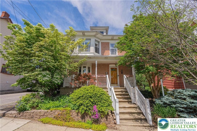 851 N Hoffert St, Fountain Hill Boro, PA 18015 - view of front of property featuring brick siding, covered porch, and stairs