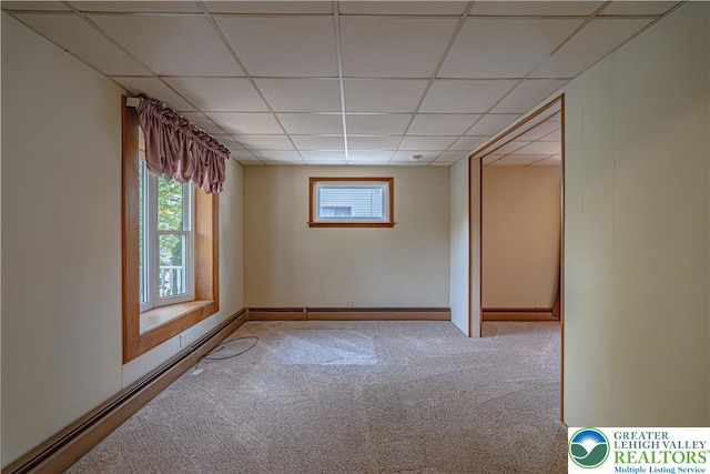 851 N Hoffert St, Fountain Hill Boro, PA 18015 - carpeted empty room with a drop ceiling, healthy amount of natural light, a baseboard heating unit, baseboard heating, and baseboards