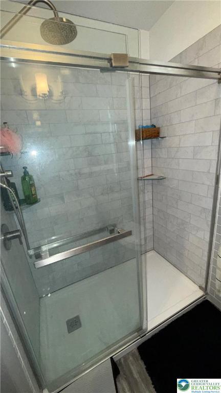 123 N Penn St, Allentown City, PA 18102 - full bathroom featuring a shower stall