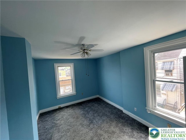 123 N Penn St, Allentown City, PA 18102 - unfurnished room featuring dark colored carpet, a ceiling fan, and baseboards