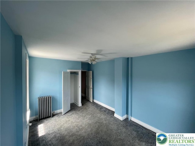123 N Penn St, Allentown City, PA 18102 - unfurnished bedroom featuring radiator, carpet floors, baseboards, ceiling fan, and a closet