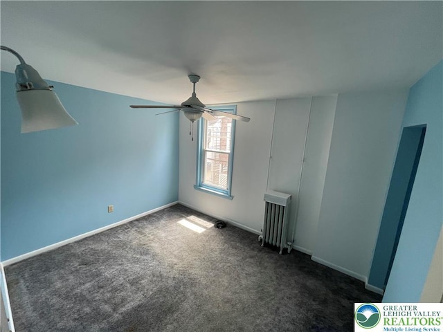 123 N Penn St, Allentown City, PA 18102 - empty room featuring radiator, dark colored carpet, a ceiling fan, and baseboards