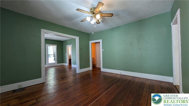 30 S Broad St, East Bangor Borough, PA 18013 - unfurnished room featuring baseboards, ceiling fan, and dark wood-style floors