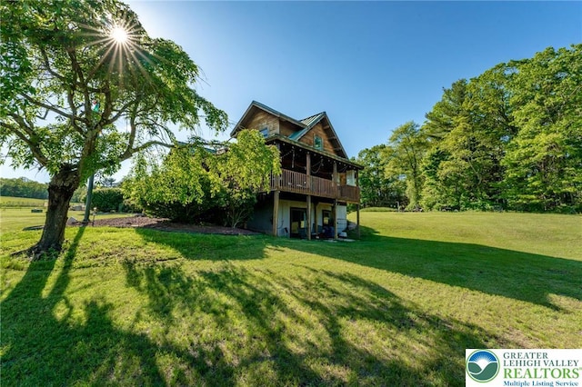 1650 Spruce Hollow Rd, Towamensing Township, PA 18071 - rear view of house with a lawn and a deck
