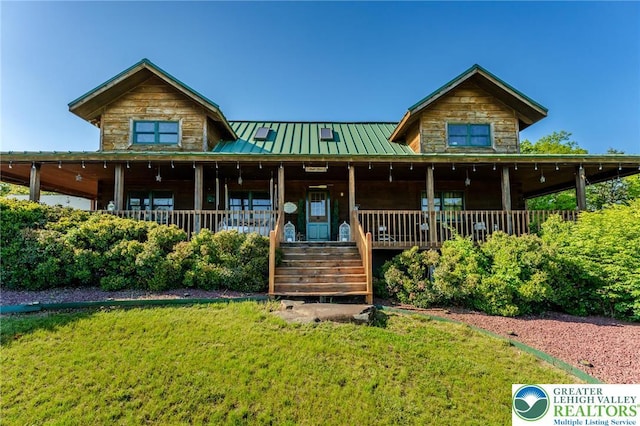 1650 Spruce Hollow Rd, Towamensing Township, PA 18071 - view of front of property featuring covered porch, a standing seam roof, a front yard, and metal roof