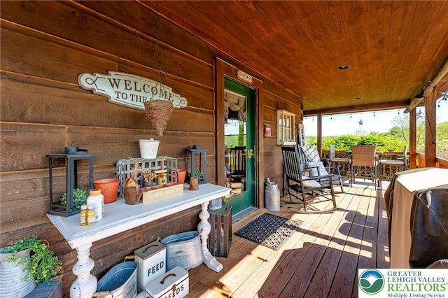 1650 Spruce Hollow Rd, Towamensing Township, PA 18071 - wooden porch with outdoor dining space