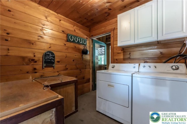 1650 Spruce Hollow Rd, Towamensing Township, PA 18071 - washroom with cabinet space, washer and dryer, wooden walls, and wood ceiling