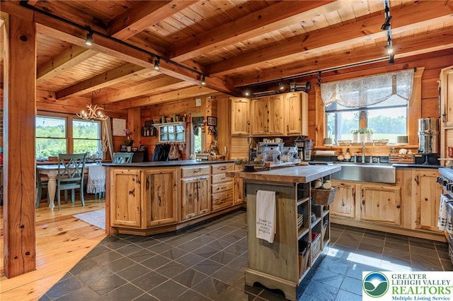 1650 Spruce Hollow Rd, Towamensing Township, PA 18071 - kitchen featuring dark countertops, wood ceiling with exposed beams, a sink, rail lighting, and a chandelier