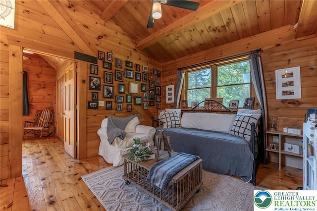 1650 Spruce Hollow Rd, Towamensing Township, PA 18071 - living area with light wood-style flooring, wood walls, wood ceiling, and ceiling fan