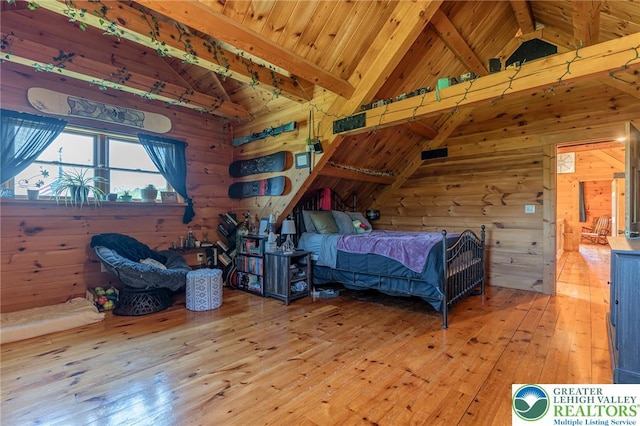 1650 Spruce Hollow Rd, Towamensing Township, PA 18071 - bedroom featuring hardwood / wood-style floors, wooden walls, wood ceiling with exposed beams, and high vaulted ceiling