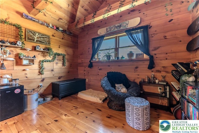1650 Spruce Hollow Rd, Towamensing Township, PA 18071 - living area featuring hardwood / wood-style floors, wood walls, vaulted ceiling, and wooden ceiling