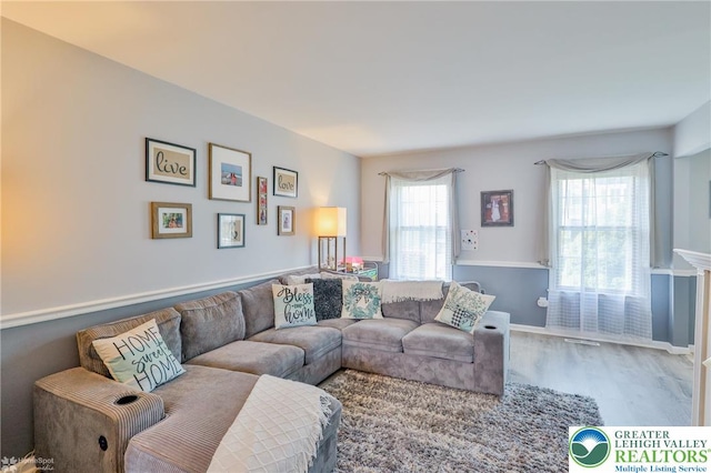 3940 Dewalt St, Bethlehem Twp, PA 18020 - living room with wood finished floors and baseboards