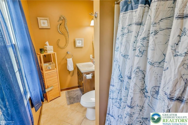 3940 Dewalt St, Bethlehem Twp, PA 18020 - full bath with tile patterned flooring, vanity, toilet, and curtained shower