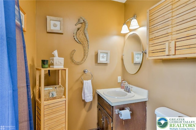 3940 Dewalt St, Bethlehem Twp, PA 18020 - half bathroom featuring vanity and toilet