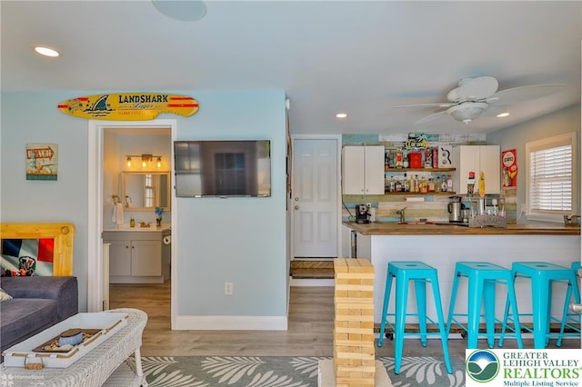3940 Dewalt St, Bethlehem Twp, PA 18020 - kitchen featuring light wood-style flooring, white cabinetry, open shelves, recessed lighting, and a ceiling fan