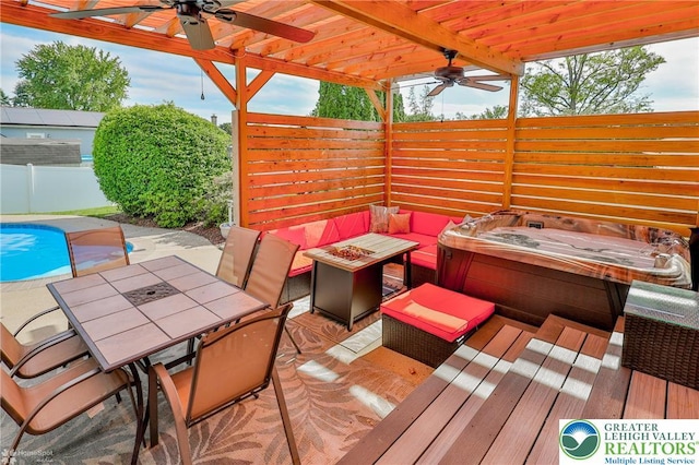 3940 Dewalt St, Bethlehem Twp, PA 18020 - fenced backyard featuring ceiling fan, outdoor dining area, a pergola, and a hot tub