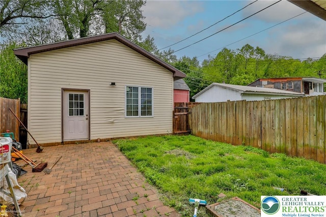 4 Front St, Glendon Borough, PA 18042 - rear view of house featuring a patio area