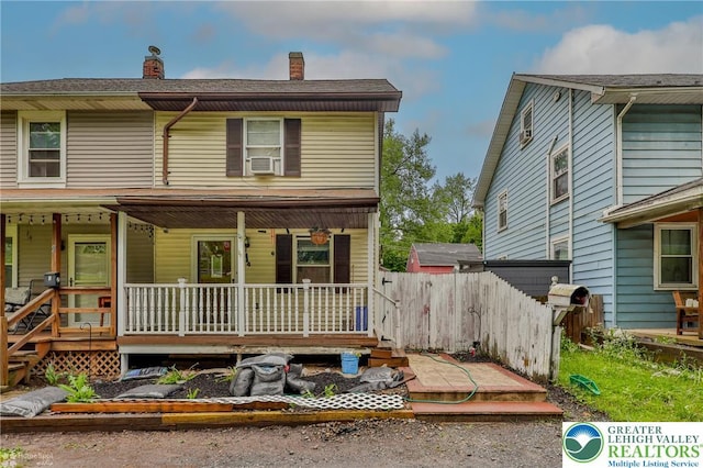 4 Front St, Glendon Borough, PA 18042 - view of front of property with a chimney, covered porch, and cooling unit