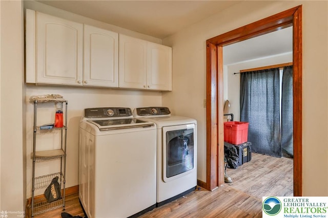 4 Front St, Glendon Borough, PA 18042 - washroom featuring cabinet space, washer and clothes dryer, light wood-type flooring, and baseboards