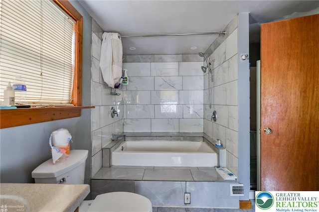 4 Front St, Glendon Borough, PA 18042 - bathroom featuring toilet, shower / tub combination, and vanity