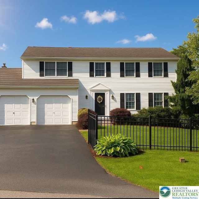 204 Rugby, Exeter Township, PA 19508 - view of front facade with driveway and a garage