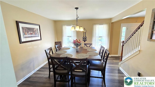 4125 Redbud Dr W, Whitehall Twp, PA 18052 - dining space with dark wood-type flooring, a chandelier, stairs, and baseboards