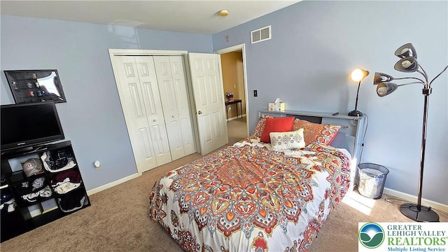 4125 Redbud Dr W, Whitehall Twp, PA 18052 - bedroom with carpet flooring, a closet, and baseboards