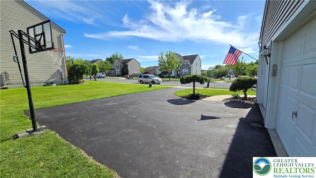 4125 Redbud Dr W, Whitehall Twp, PA 18052 - view of parking with a residential view