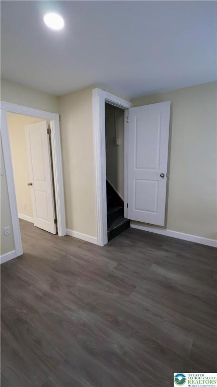 836 Elliger St, Allentown City, PA 18102 - unfurnished bedroom featuring baseboards and dark wood-type flooring