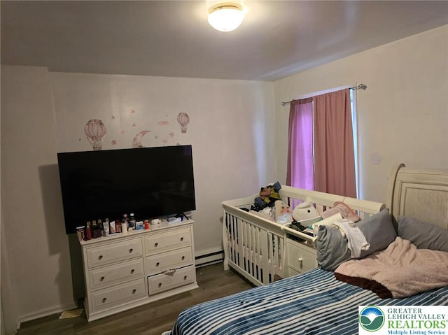 726 N 8th St, Allentown City, PA 18102 - bedroom featuring a baseboard heating unit and dark wood-style floors