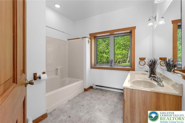 2107 Lenape Ter, Barrett Twp, PA 18325 - bathroom featuring a baseboard radiator, double vanity, baseboards, and shower / washtub combination