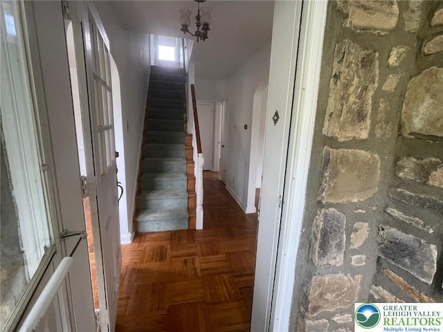 1123 Cumberland Rd, Abington, PA 19001 - stairs featuring a chandelier and baseboards