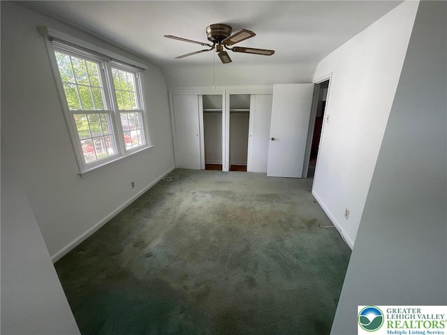 1123 Cumberland Rd, Abington, PA 19001 - unfurnished bedroom with two closets, carpet, baseboards, ceiling fan, and lofted ceiling