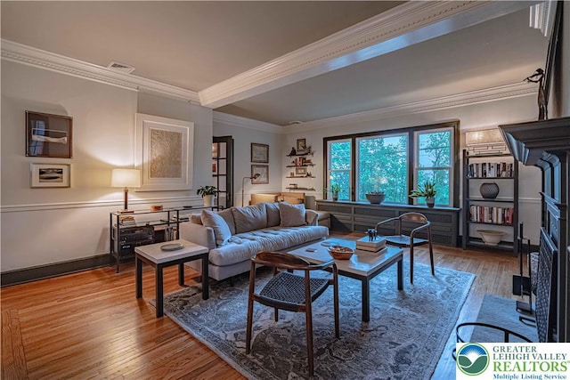 306 W Paxinosa Rd, Forks Twp, PA 18040 - living area with wood finished floors and crown molding