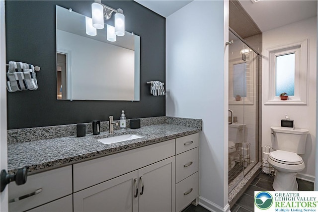 306 W Paxinosa Rd, Forks Twp, PA 18040 - full bath featuring toilet, vanity, a stall shower, a chandelier, and tile patterned flooring