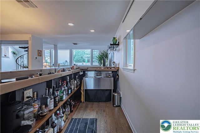 306 W Paxinosa Rd, Forks Twp, PA 18040 - bar featuring wood finished floors, recessed lighting, and baseboards