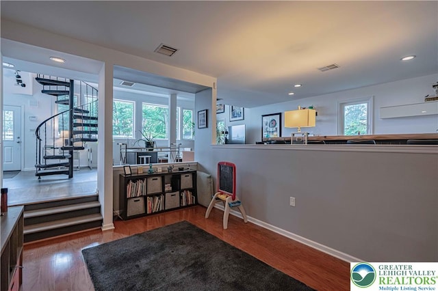 306 W Paxinosa Rd, Forks Twp, PA 18040 - dining room with stairs, wood finished floors, healthy amount of natural light, baseboards, and recessed lighting