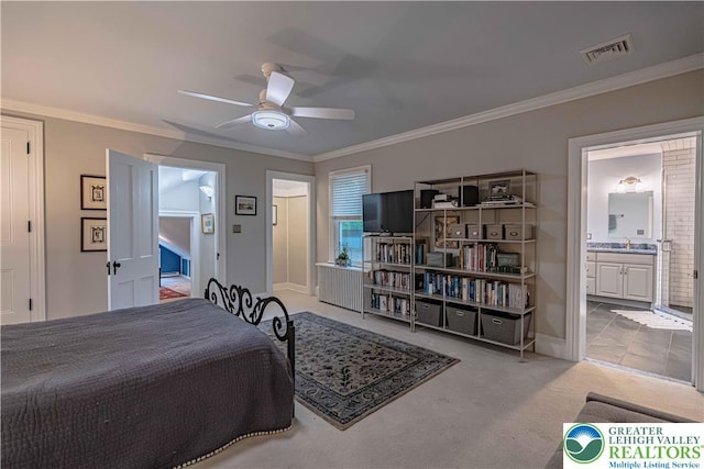 306 W Paxinosa Rd, Forks Twp, PA 18040 - bedroom with connected bathroom, carpet flooring, crown molding, baseboards, and a sink