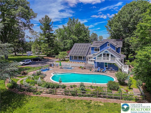 306 W Paxinosa Rd, Forks Twp, PA 18040 - view of pool featuring a patio, stairway, and a deck