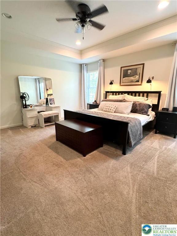 3183 Sheffield Dr, Lower Macungie Twp, PA 18049 - bedroom featuring light carpet, ceiling fan, a tray ceiling, recessed lighting, and baseboards