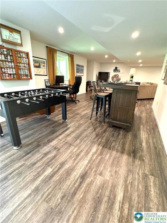 3183 Sheffield Dr, Lower Macungie Twp, PA 18049 - game room featuring dark wood-style floors, a bar, and recessed lighting