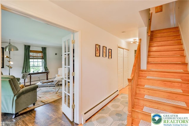 113 S Fairview St, Macungie Borough, PA 18062 - stairway featuring a baseboard radiator and wood finished floors