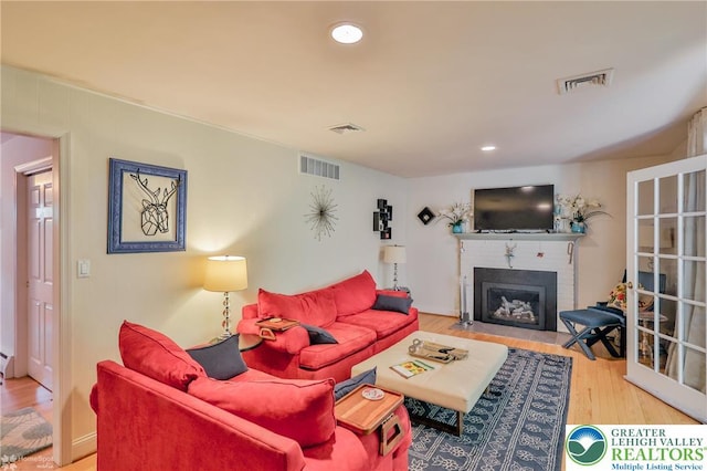 113 S Fairview St, Macungie Borough, PA 18062 - living room with a brick fireplace, wood finished floors, and recessed lighting