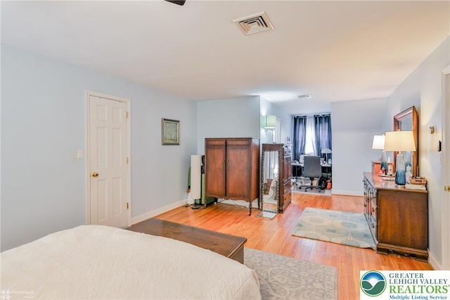 113 S Fairview St, Macungie Borough, PA 18062 - bedroom featuring an office area, light wood finished floors, and baseboards